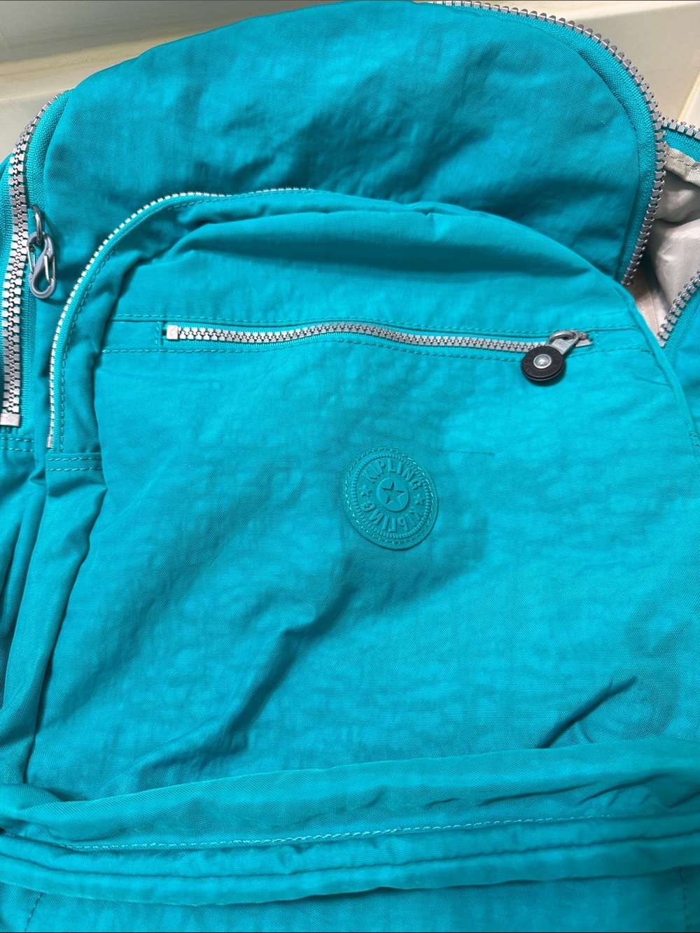 Kipling Turquoise Nylon Backpack with Front Zip Pocket